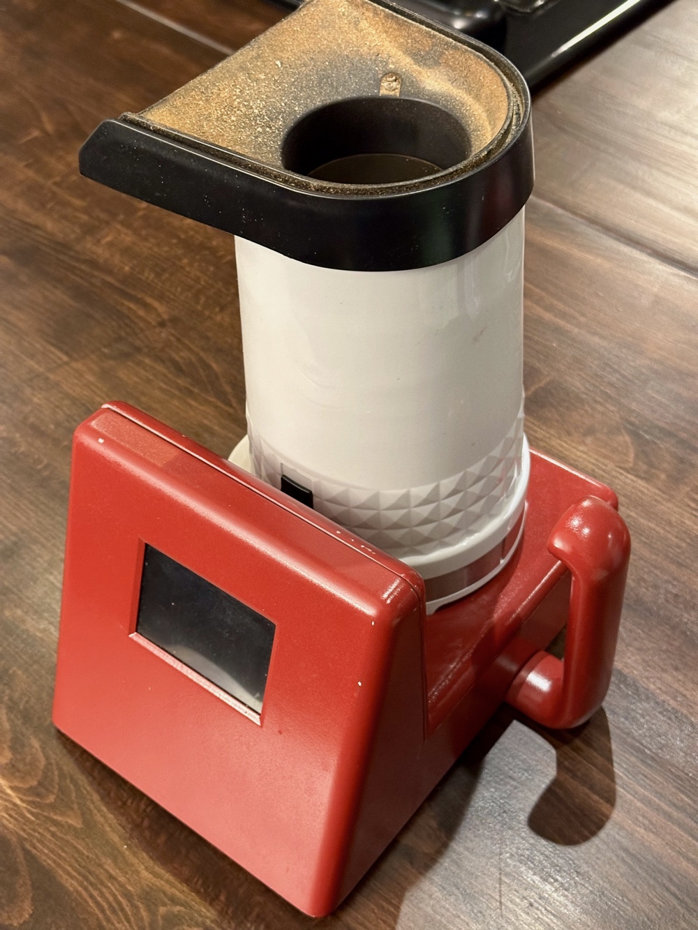 Completed coffee roaster with 3D-printed red enclosure, Nextion display, and popcorn popper roasting chamber