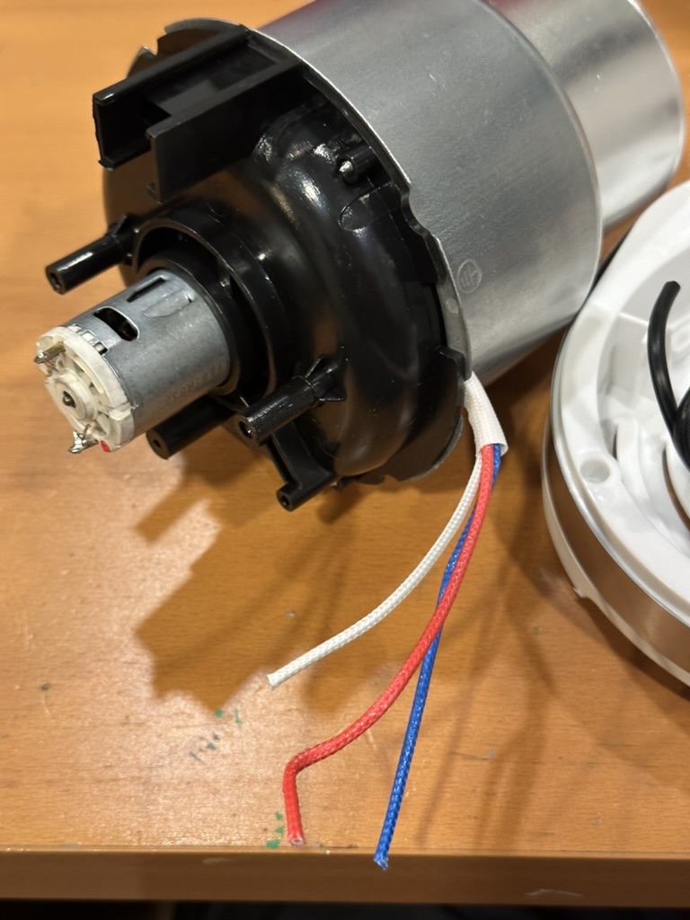 Popper disassembled showing heater and fan motor wiring