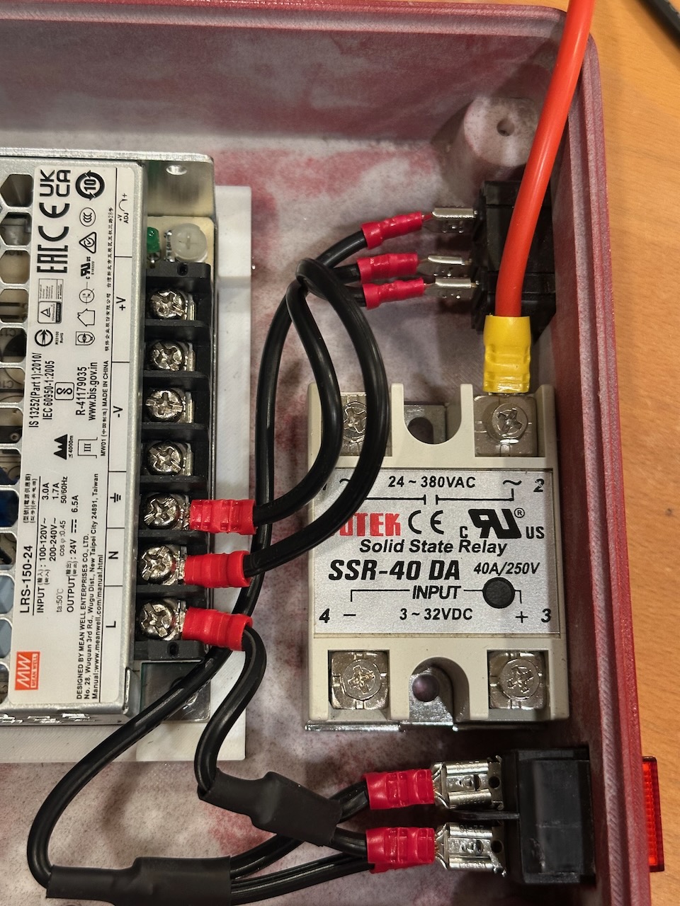 Custom PCB installed in the enclosure with wiring connected